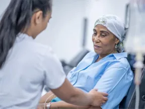 Woman receiving in-center dialysis