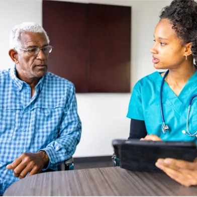 Individual speaks with medical professional 