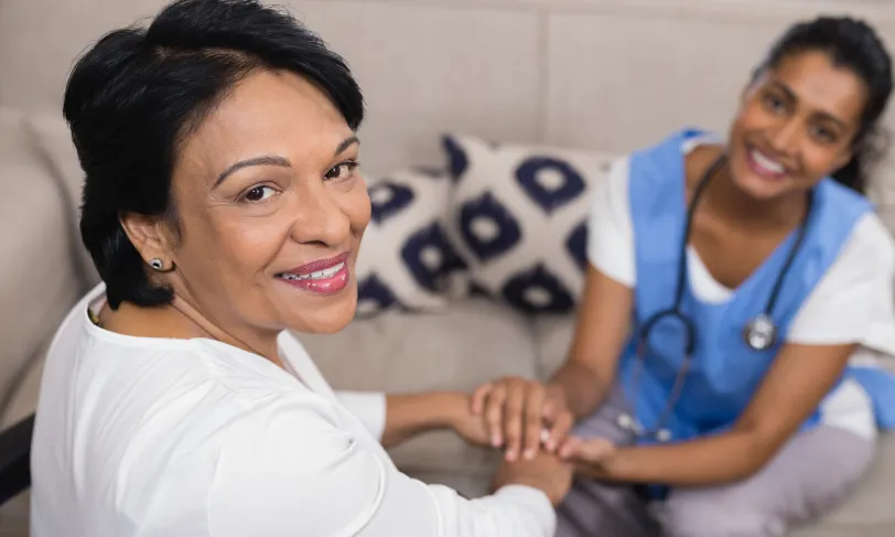 home healthcare worker comforting patient